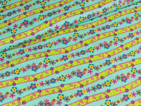 Baumwollstoff Blumenreihe bunt auf Helltürkis