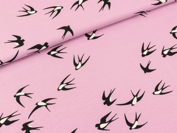 Baumwolljersey Schwalben auf flieder