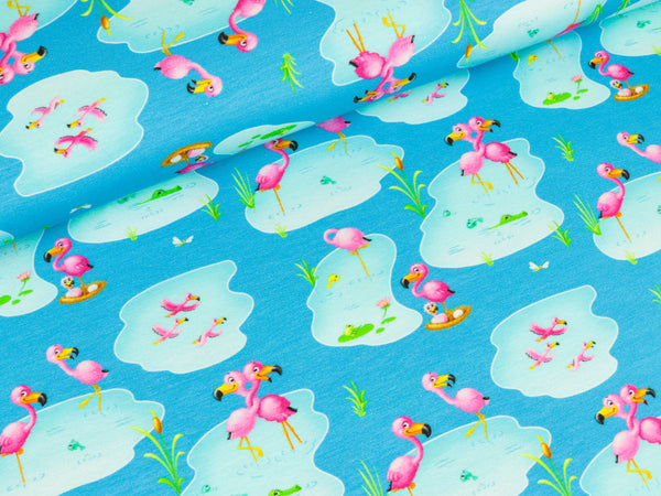 Baumwolljersey Kimi Flamingoliebe auf Hellblau