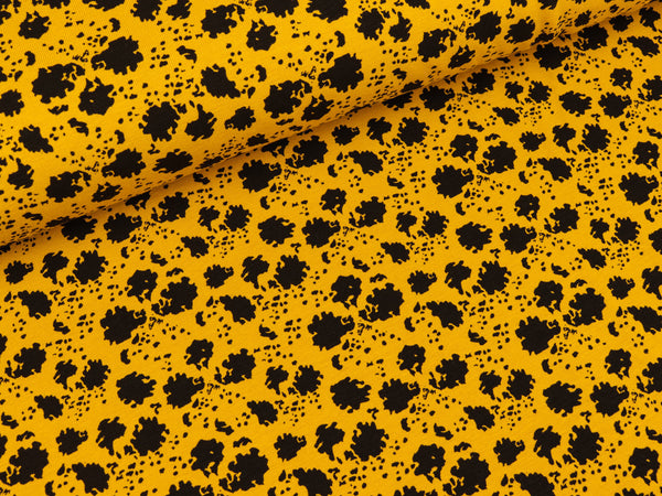 Baumwolljersey Paint Splash schwarz-senfgelb