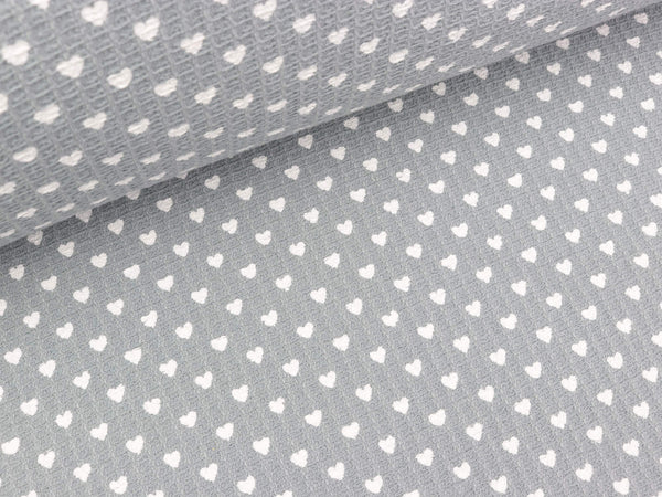 Waffelpiqué Kleine Herzen weiß auf Hellgrau