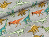 Baumwolljersey Dinosaurier Walk bunt auf grau meliert
