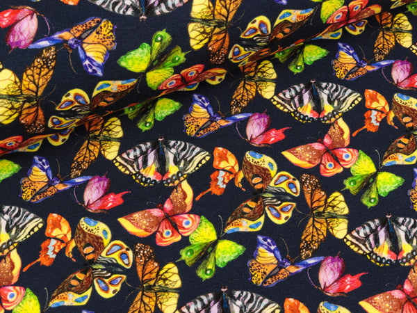 French Terry Butterfly Art Schmetterlinge bunt auf Tiefblau