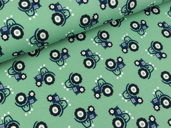 Reststück 17cm - Baumwolljersey Mini Tractor lapis blue auf Greenery