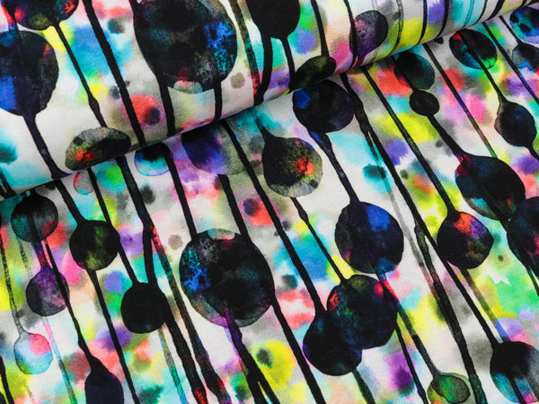 Baumwolljersey Paint Drops bunt auf Hellgrau