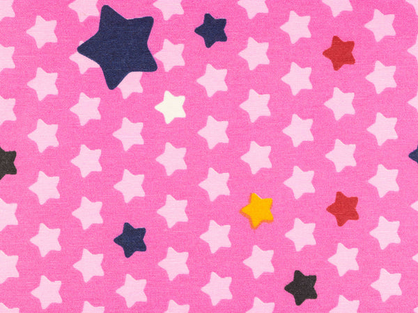 Beschichtete Baumwolle Flurin Sterne bunt auf Pink