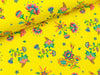Baumwolljersey Flowers bunt auf Gelb