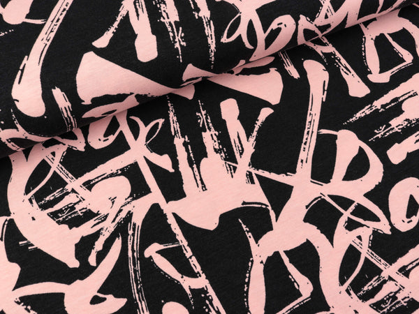 Modaljersey Brush Schriftzüge rosa auf Schwarz