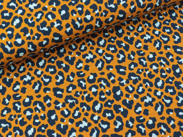 Baumwolljersey Tropical Forest Leoprint bunt auf Ocker