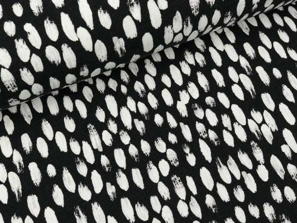 Reststück 51cm - Modalsweat Brush Tupfen weiß auf Schwarz by Cherry Picking