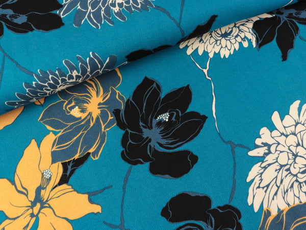 Viskose Twill Print Blumen bunt auf Petrol