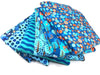 Reststück 40cm - Steinbeck Baumwolljersey Woody Kringel bunt auf Blau