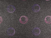 Beschichtete Baumwolle Leonie mit Kreisen schwarz-pink-lila Glitzer