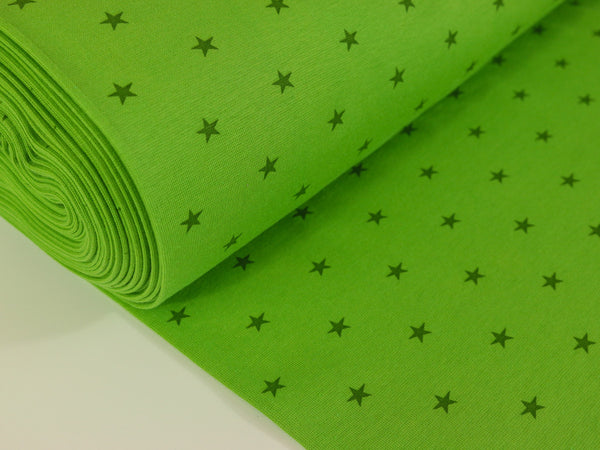 Glatte Bündchenware lime mit Sternen