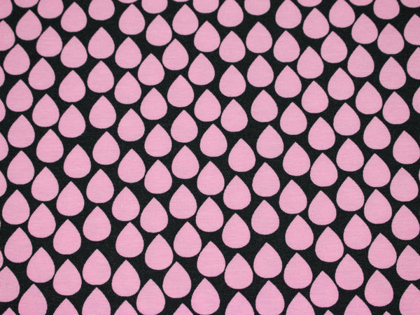 Baumwolljersey Tropfen rosa auf Schwarz