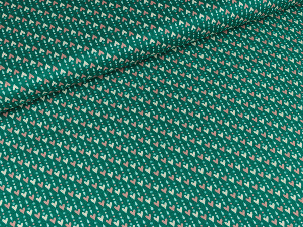 Baumwollstoff Pop Up Herzchen auf Smaragdgrün