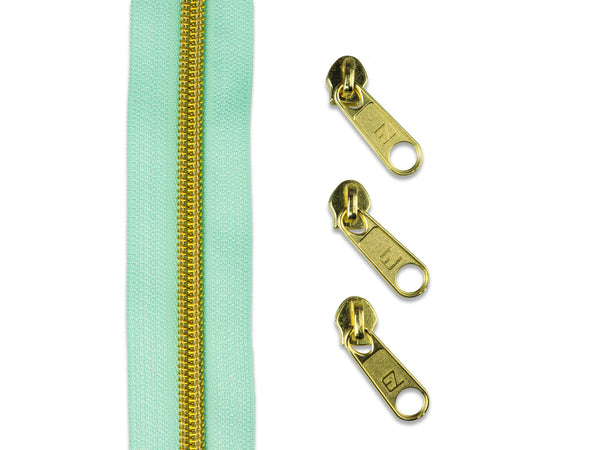 1m Endlosreißverschluss metallisiert mint/gold + 3 Zipper