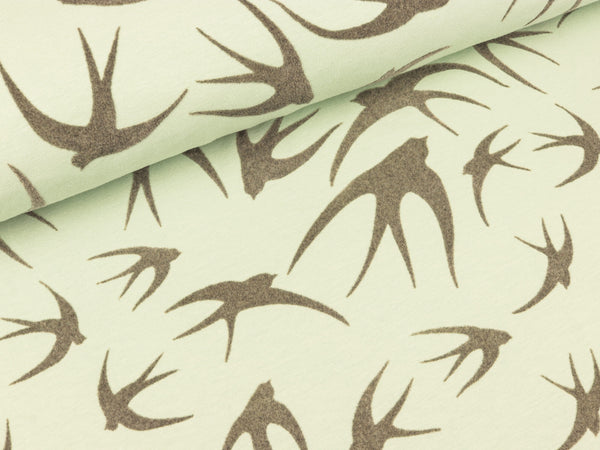 Baumwolljersey Schwalben grau auf Mint Flockprint