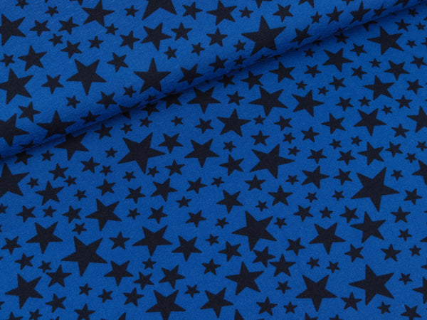 Baumwolljersey Unregelmäßige Sterne tiefblau auf Royalblau