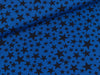 Baumwolljersey Unregelmäßige Sterne tiefblau auf Royalblau