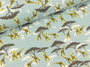 Baumwolljersey Safari Print Giraffen auf Wasserblau