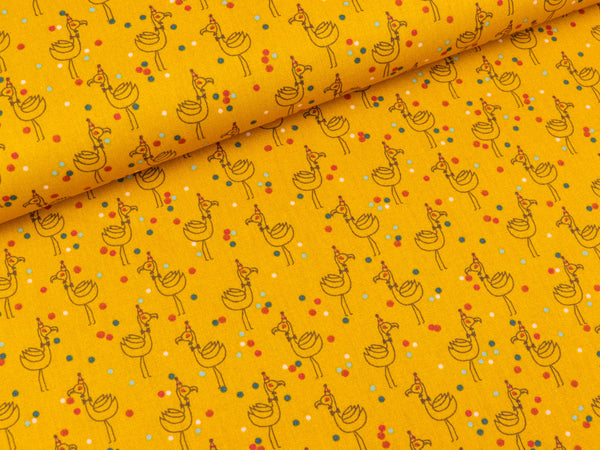 Baumwollstoff We like to Party Flamingo mit dem Partyhut ocker