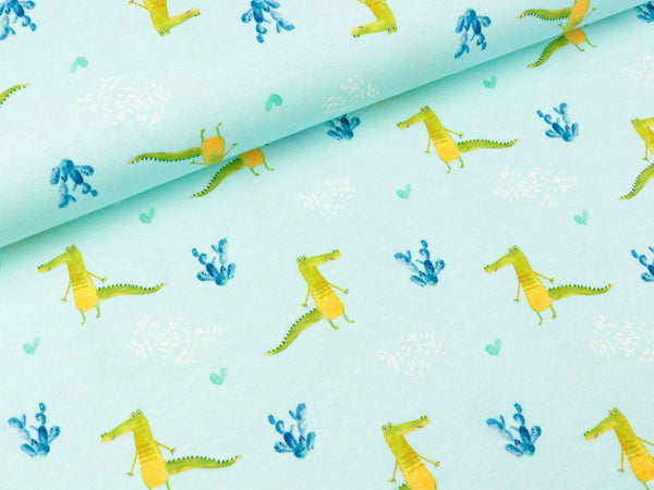 Baumwolljersey Tommy Krokodile und Herzen auf Wasserblau