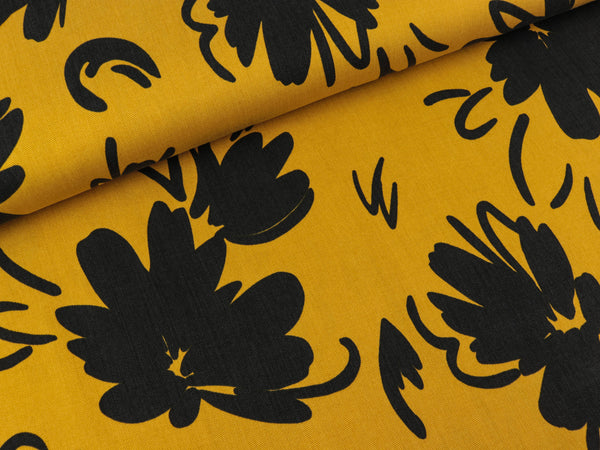 TENCEL Webware Blumen schwarz auf Ocker