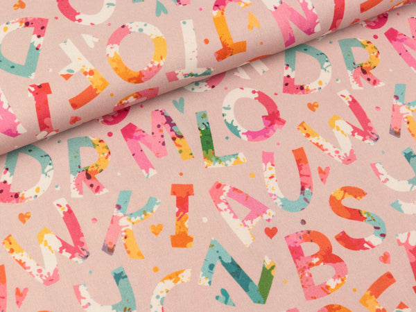 Baumwoll Webware Kim Bunte Buchstaben auf Staubrosa