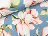 Baumwolljersey Magnolienblüten auf Light blue Digitaldruck