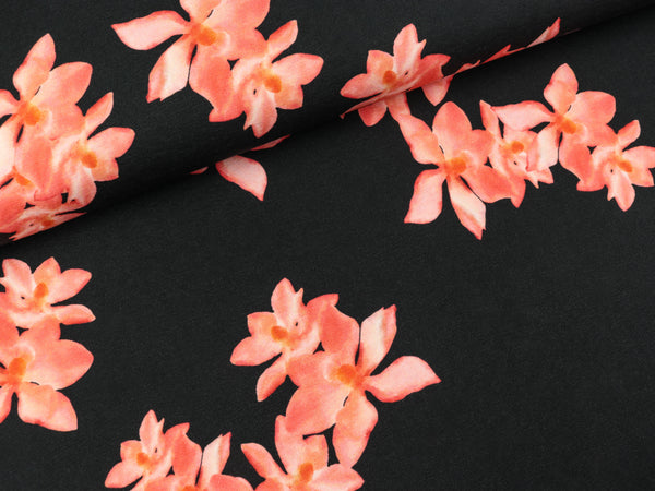 Baumwolljersey Elise Magnolienblüten koralle auf Schwarz by Bienvenido Colorido