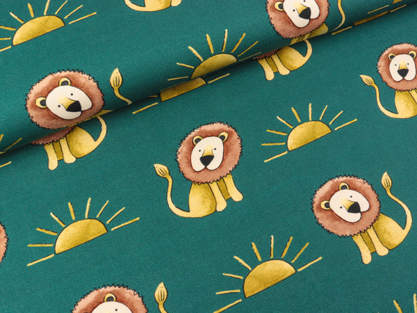 Baumwolljersey Savana Friends Löwen und Sonnen auf Petrol