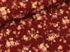 Baumwolljersey Henry Streublümchen auf Orientrot