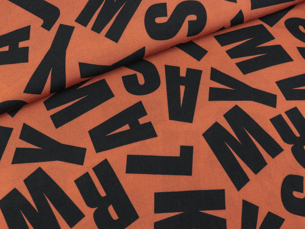 Viskose Webware Pauline Buchstaben schwarz auf Terra