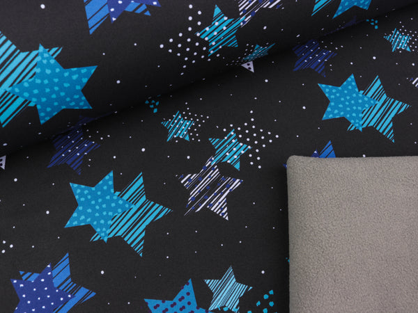 Softshell Fiete Sterne türkis-royalblau-petrol-bunt auf Schwarz