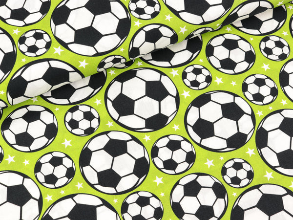 Baumwoll Webware Kim Fußbälle und Sterne auf Kiwigrün