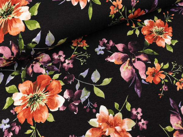 Viskosejersey Flowers orangerot-bunt auf Schwarz