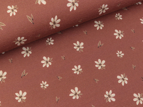 Bio Baumwolljersey Blümchen creme auf Rotbraun