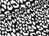 Viskosejersey Gepardenflecken weiß auf Schwarz