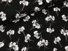 Gewebter Stretch Viskosestoff Blumen weiß auf Schwarz
