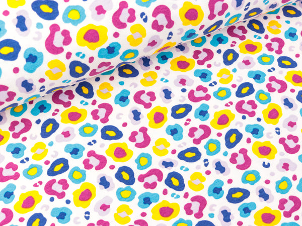Baumwolljersey Leomuster fuchsia-türkis-gelb-bunt auf Weiß