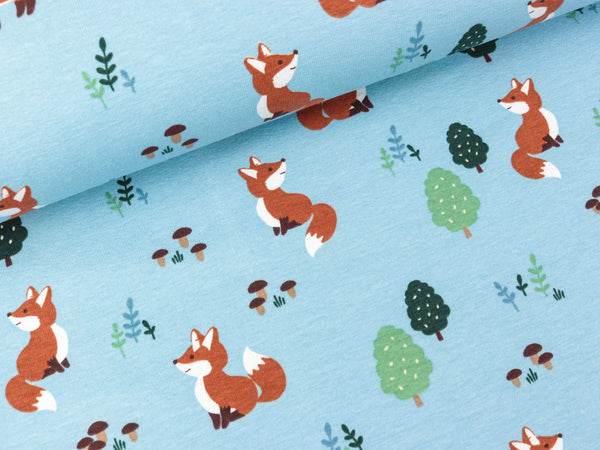 Baumwolljersey Füchse im Wald bunt auf Wasserblau