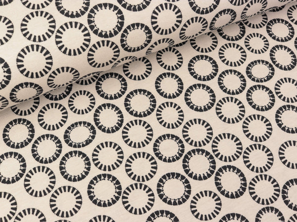 Baumwolljersey Circles schwarz auf Sand