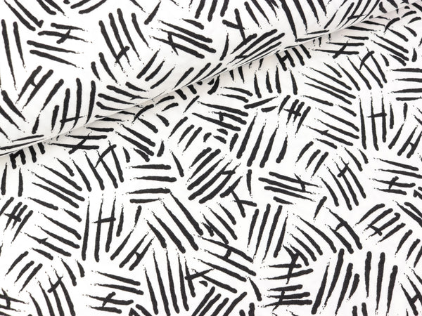 Baumwolljersey Strokes schwarz auf Weiß