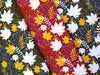 Baumwollsweat Toronto Ahornblätter bunt auf Burgundy